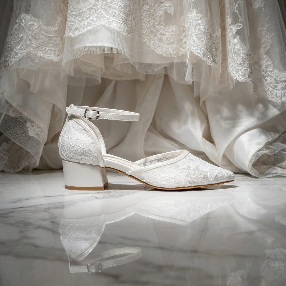 Comfortable low heel bridal shoes with breathable lace mesh and sturdy block heel for garden or beach weddings.