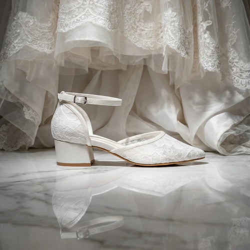 Comfortable low heel bridal shoes with breathable lace mesh and sturdy block heel for garden or beach weddings.